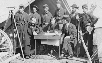 Union topographical engineers, Army of the Potomac, at Camp Winfield Scott, near Yorktown, Virginia, likely May, 1862. Captain William H. Paine is seated at left. Courtesy of the Library of Congress.